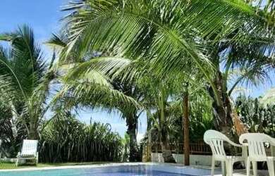 Imagem: A casa possui 3 Dormitórios, 2 Vagas na garagem e está localizado