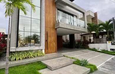 Imagem: A casa possui 3 Dormitórios, 5 Banheiros, 2 Vagas na garagem