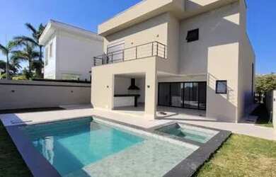 Imagem: A casa em condomínio possui 5 Dormitórios, 5 Banheiros, 4