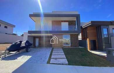 Imagem: A casa em condomínio possui 3 Dormitórios, 4 Banheiros, 254m²