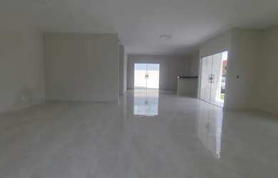 Imagem: A casa possui 3 Dormitórios, 5 Banheiros, 2 Vagas na garagem