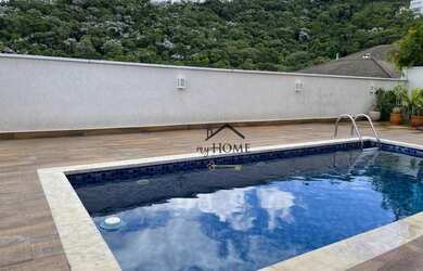 Imagem: A casa em condomínio possui 4 Dormitórios, 5 Banheiros, 4