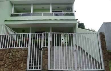 Imagem: A casa em condomínio possui 4 Dormitórios, 4 Banheiros, 2