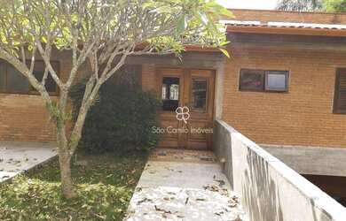 Imagem: A casa em condomínio possui 4 Dormitórios, 4 Banheiros, 5