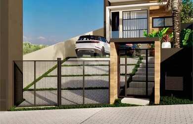 Imagem: A casa possui 3 Dormitórios, 3 Banheiros, 2 Vagas na garagem