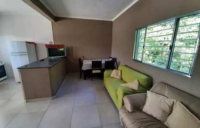 Imagem: A casa possui 2 Dormitórios, 3 Vagas na garagem e está localizado