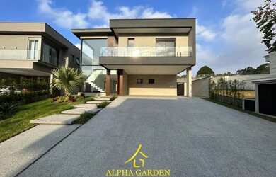 Imagem: A casa em condomínio possui 4 Dormitórios, 5 Banheiros, 2