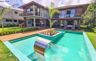 Imagem: A casa em condomínio possui 5 Dormitórios, 5 Banheiros, 4