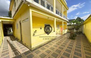 Imagem: A casa possui 4 Dormitórios, 3 Banheiros, 360m² de Área e