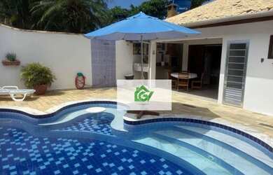 Imagem: A casa possui 3 Dormitórios, 4 Banheiros, 2 Vagas na garagem