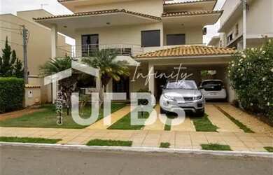 Imagem: A casa em condomínio possui 4 Dormitórios, 5 Banheiros, 4