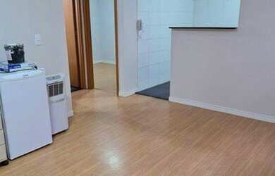 Imagem: O apartamento possui 2 Dormitórios, 1 Banheiro, 1 Vaga na garagem