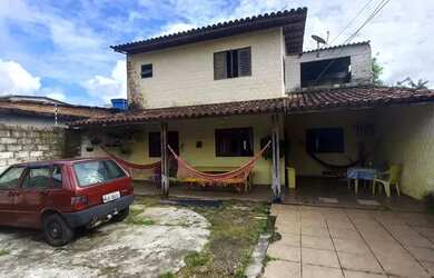 Imagem: A casa possui 3 Dormitórios, 3 Banheiros, 5 Vagas na garagem