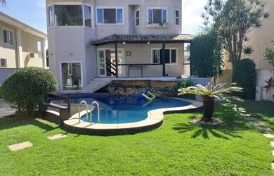 Imagem: A casa em condomínio possui 5 Dormitórios, 5 Banheiros, 3