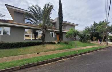 Imagem: A casa em condomínio possui 4 Dormitórios, 5 Banheiros, 4