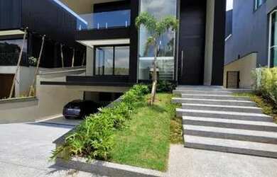 Imagem: A casa em condomínio possui 5 Dormitórios, 5 Banheiros, 5