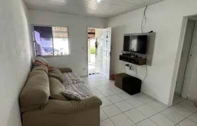 Imagem: A casa possui 3 Dormitórios, 2 Banheiros, 2 Vagas na garagem