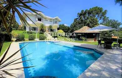 Imagem: A casa em condomínio possui 4 Dormitórios, 5 Banheiros, 5