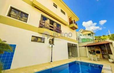 Imagem: A casa possui 4 Dormitórios, 5 Banheiros, 5 Vagas na garagem