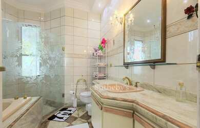 Imagem 13: Casa com amplos ambientes em condomínio fechado