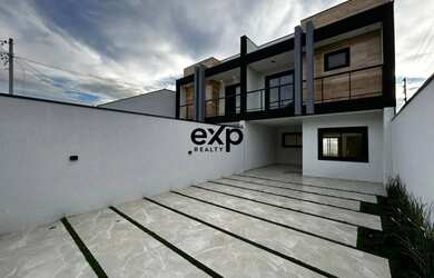 Imagem: A casa possui 3 Dormitórios, 3 Banheiros, 3 Vagas na garagem