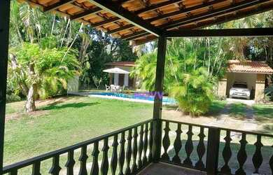 Imagem: A casa possui 3 Dormitórios, 4 Banheiros, 2 Vagas na garagem