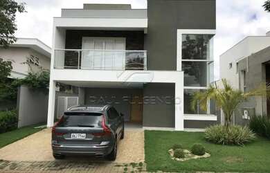 Imagem: A casa possui 4 Dormitórios, 5 Banheiros, 2 Vagas na garagem