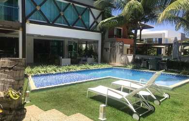 Imagem: A casa possui 5 Dormitórios, 5 Banheiros, 5 Vagas na garagem