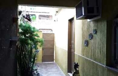 Imagem: A casa possui 2 Dormitórios e 1 Banheiro e está localizado