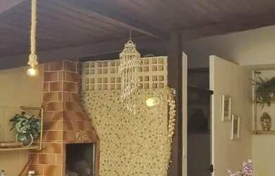 Imagem: A casa em condomínio possui 4 Dormitórios, 3 Banheiros, 2