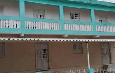 Imagem: A casa possui 2 Dormitórios, 1 Banheiro, 4 Vagas na garagem