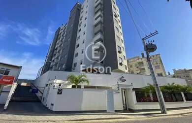 Imagem: O apartamento possui 3 Dormitórios, 1 Banheiro, 1 Vaga na garagem