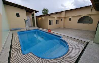 Imagem: A casa possui 4 Dormitórios, 4 Banheiros, 4 Vagas na garagem