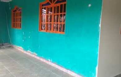 Imagem: A casa possui 2 Dormitórios, 1 Banheiro, 2 Vagas na garagem