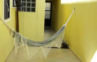 Imagem: A casa possui 3 Dormitórios, 2 Banheiros e está localizado