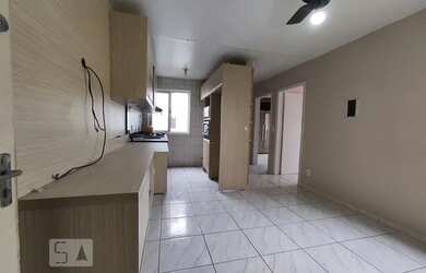 Imagem: O apartamento possui 2 Dormitórios, 1 Banheiro, 1 Vaga na garagem