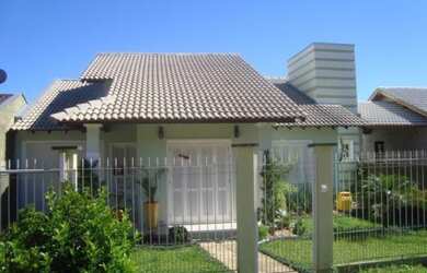 Imagem: A casa possui 3 Dormitórios, 2 Banheiros, 84m² de Área e