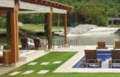 Imagem: A casa em condomínio possui 5 Dormitórios, 5 Banheiros, 4