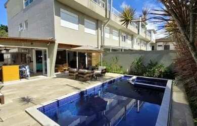 Imagem: A casa em condomínio possui 4 Dormitórios, 4 Banheiros, 2