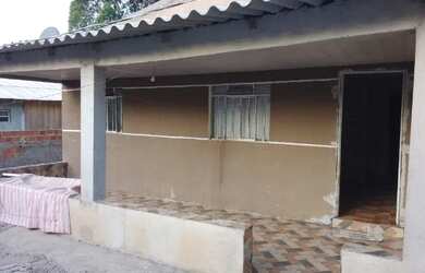 Imagem: A casa possui 2 Dormitórios, 1 Banheiro, 1 Vaga na garagem