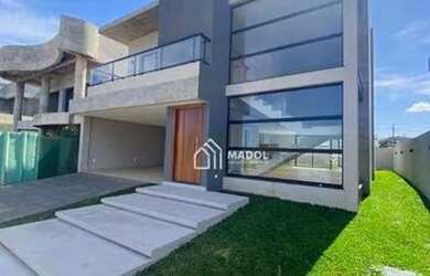 Imagem: A casa em condomínio possui 3 Dormitórios, 4 Banheiros, 210m²