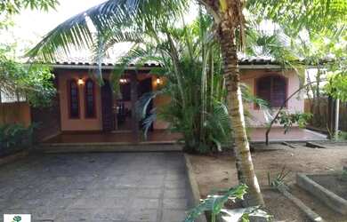 Imagem: A casa possui 3 Dormitórios, 3 Banheiros, 3 Vagas na garagem