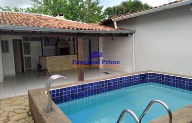 Imagem: A casa possui 3 Dormitórios, 4 Banheiros, 2 Vagas na garagem