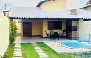 Imagem: A casa possui 3 Dormitórios, 3 Vagas na garagem e está localizado