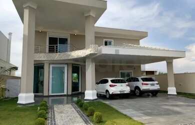 Imagem: A casa possui 4 Dormitórios, 1 Banheiro, 4 Vagas na garagem