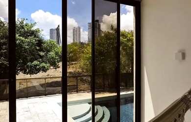 Imagem: A casa em condomínio possui 4 Dormitórios, 5 Banheiros, 4