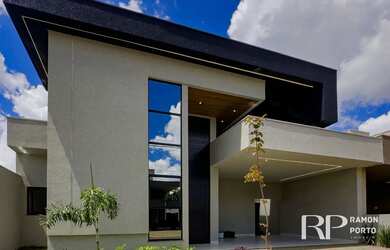 Imagem: A casa possui 3 Dormitórios, 3 Banheiros, 2 Vagas na garagem