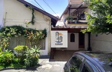 Imagem: A casa possui 4 Dormitórios, 3 Banheiros, 5 Vagas na garagem