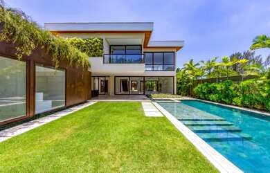 Imagem: A casa em condomínio possui 5 Dormitórios, 5 Banheiros, 1