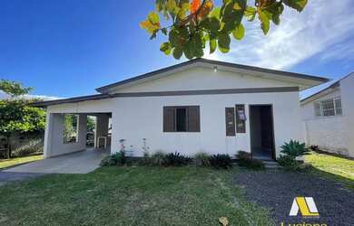 Imagem: A casa possui 2 Dormitórios, 1 Banheiro, 1 Vaga na garagem
